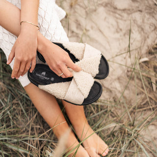 Alba Fårskinnstofflor